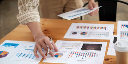 Businessman and estate agent signing a document for house deal