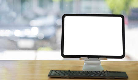 Close up Business woman using calculator and laptop for do math finance on wooden desk in office and...