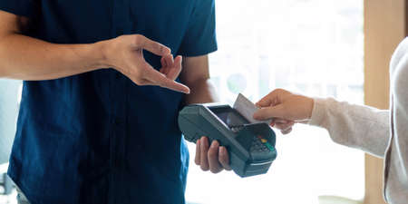 Businessman using calculator for analysis maketing plan, Accountant calculate financial report,...