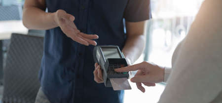 Credit card payment, buy and sell products & service, close-up buttonの写真素材