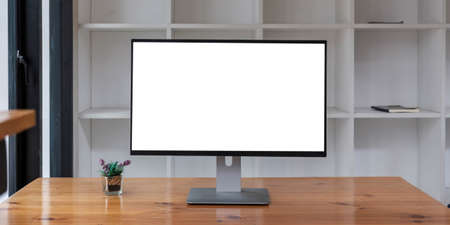 Laptop with blank screen on table. Workspace background new project on laptop computer with blank...