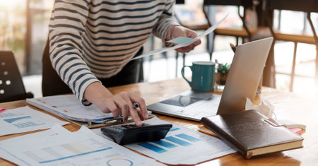Online payment,Man's hands holding smartphone and using credit card for online shopping. Cyber...