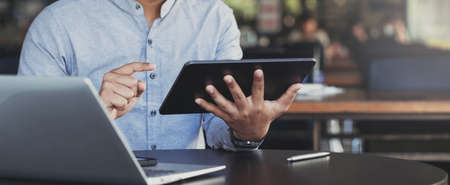 Online payment,Man's hands holding credit card and using laptop for online shopping. Cyber Monday Conceptの写真素材