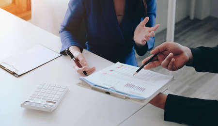 Close up Business people meeting to discuss the situation on the market. Business Financial Concept