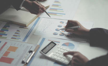 Fund managers team consultation and discuss about analysis Investment stock market by digital...