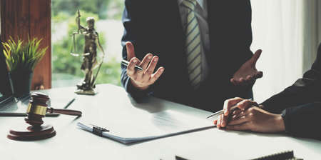 Businessman and lawyer discuss the contract document. Treaty of the law. Sign a contract business.