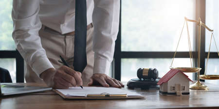 Businessman and lawyer discuss the contract document. Treaty of the law. Sign a contract business.
