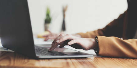 Portrait of smiling beautiful business asian woman working in modern office desk using tablet laptop computer, Business people employee freelance online marketing e-commerce telemarketing concept.の写真素材