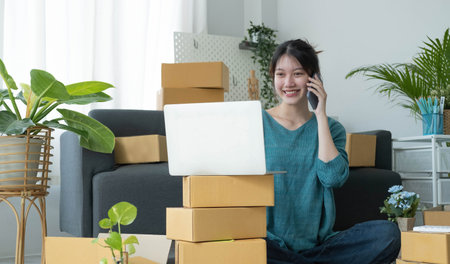 Portrait of Starting small businesses SME owners female entrepreneurs working on receipt box and...