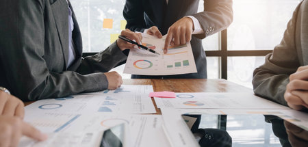 Team of business people working together in the meeting room office, teamwork background charts and graphs banner, double exposure successful teamwork,business planning concept.の写真素材