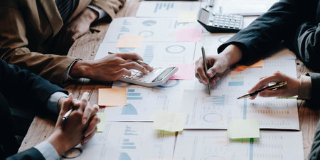 Asian business adviser meeting to analyze and discuss the situation on the financial report in the meeting room.Investment Consultant, Financial advisor and accounting conceptの写真素材