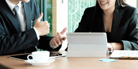 Fund managers team consultation and discuss about analysis Investment stock market by digital...