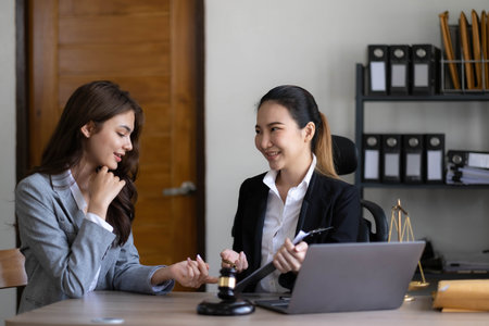 business people and lawyers discussing contract papers sitting at the table. Concepts of law, advice, legal services, legal and judgment conceptの写真素材
