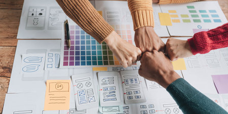 Successful meeting. Teamwork and programming websites and mobile applications on the phone, so-called. user experience UX. Web designer, UX UI designer planning application for mobile phone.の写真素材