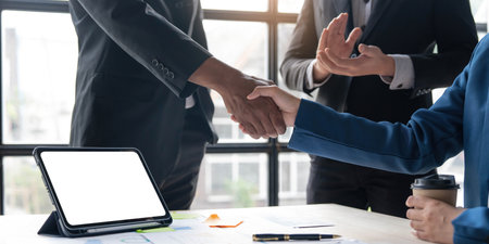 Business handshake for teamwork of business merger and acquisition,successful negotiate,hand...