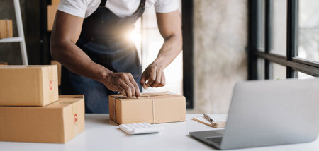 Start up small business entrepreneur SME or freelance asian man working with box at home concept,...