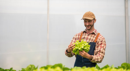 Farmer checking quality by tablet agriculture modern technology. Concept using modern technologies in agriculture.の写真素材