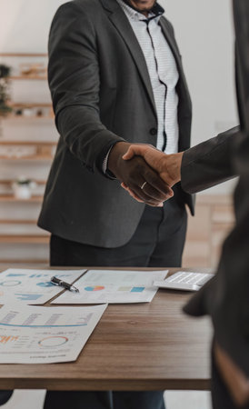 Businessmen making handshake with partner, greeting, dealing, merger and acquisition, business cooperation concept, for business, finance and investment background, teamwork and successful businessの写真素材