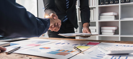 Business handshake for teamwork of business merger and acquisition,successful negotiate,hand...