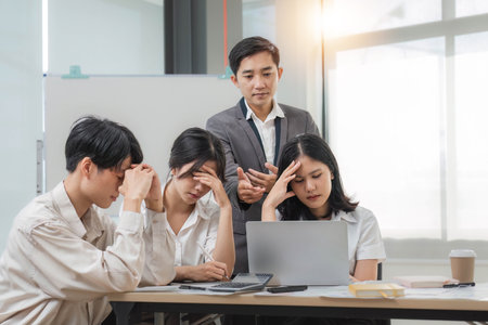 Group of creative asian business meeting and discussing strategy startup project analysis finance .Success asian business people work plan and brainstorm marketing idea with laptop in office.Teamworkの写真素材