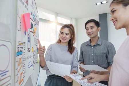 Asian office team brainstorming, plan for solution idea, Group of asia creative teamwork and woman...