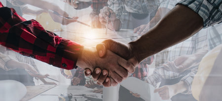 Intelligent engineering and design management Join hands for the success of teamwork in project work and business alliances in creating results for the organization.の写真素材