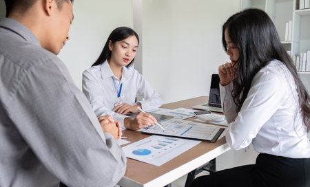 Business colleagues who are tired from company meetings Stress problems at work Conflict of business people.の写真素材