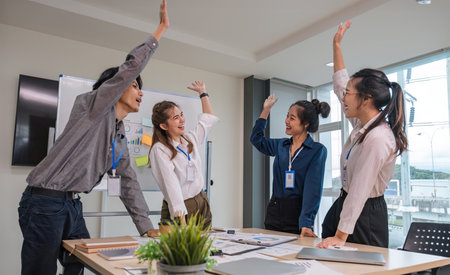 Group of Young Asian business team creative businesspeople coworker in office Happy to be successful...