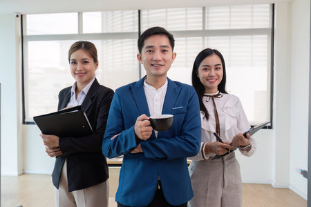 Smart and successful business team Leaders or managers who appear happy, satisfied, or confident in their work.の写真素材