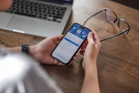 CHIANG MAI, THAILAND - OCT 4, 2023: Facebook social media app logo on log-in, sign-up registration...