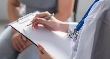The female doctor gives advice to patient and recommends ways to take care of their health and...