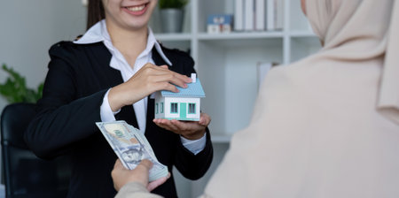 A real estate agent offers a house to a female Muslim client. The concept of buying and selling...