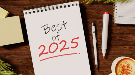 Best of 2025 spiral notebook with red pen on desk, 3D render