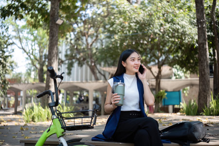 Bicycling for clean energy reducing pollution in urban landscapes with eco-friendly transportationの写真素材