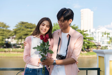 Valentines day surprise romantic gesture park bright atmosphere close-up love storyの写真素材