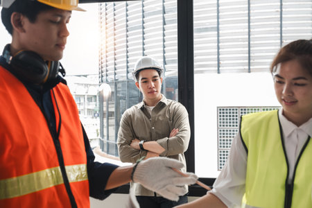 Engineering team having a discussion at construction site