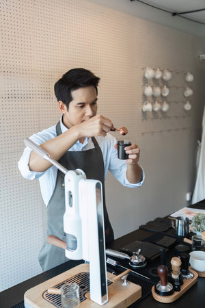 Specialized Coffee Preparation. A skilled barista expertly measuring coffee grounds in a stylish...