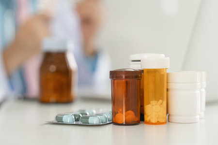 Medicines and Patient Care. Prescription bottles and medications organized for effective healthcare management.の写真素材