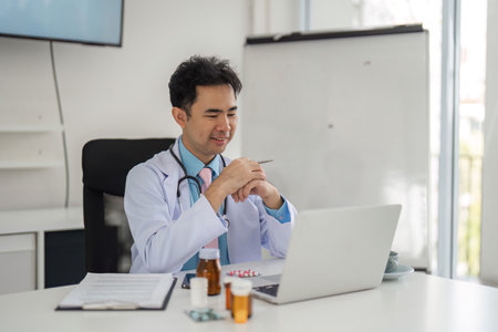 Telehealth and Remote Patient Management. A doctor uses video technology to assess a patient condition, ensuring personalized care.の写真素材