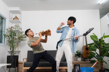 Creative Cleaning Session. Two friends enjoying a musical cleaning experience together.