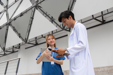 Healthcare professionals collaborating in clinic medical setting photograph indoor close-up teamwork...