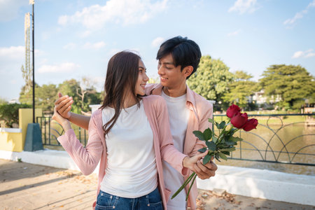 Valentines day celebration of love romantic park couple portrait outdoor setting intimate moment...