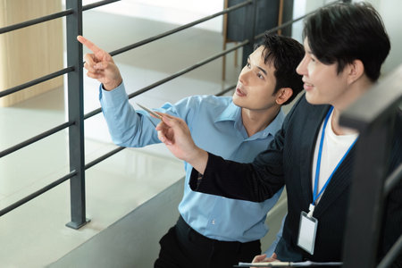 Property Tour. Real estate agents showing a property to potential buyers.の写真素材