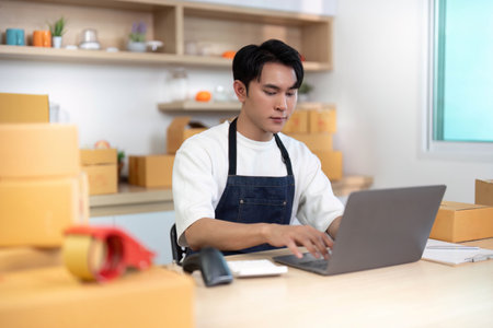E-commerce entrepreneur managing online orders in a modern workspace
