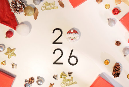 Christmas and New Year Festivities. Decorative elements celebrating 2026 with gifts and ornaments.の写真素材