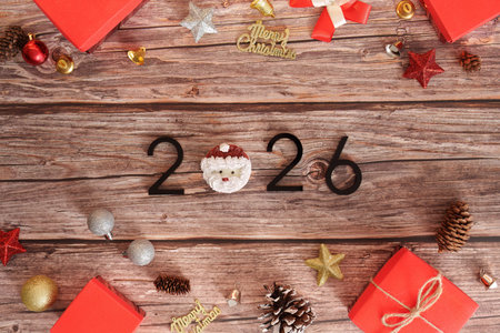 Christmas and New Year Decor. Celebratory arrangement featuring 2026 with gifts and ornaments.