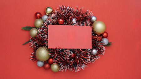 Christmas Background with Decorative Wreath and Ornamentsの写真素材