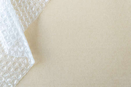 cardboard and wrap for packing orders.