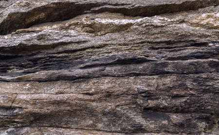 ledges on a layered brown rock textureの写真素材