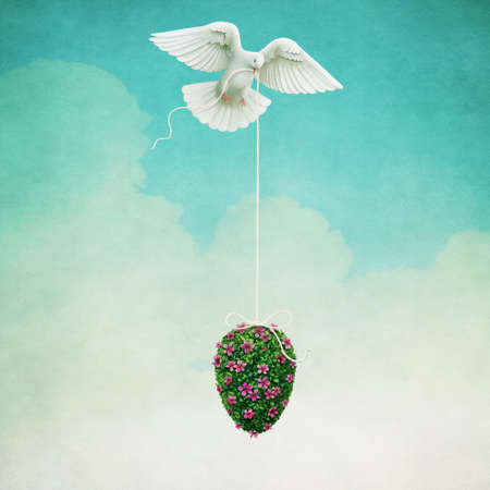 Holiday greeting card with Easter Egg from grass and flowers and Dove.の写真素材